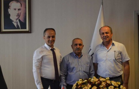 Başkanımız Burhan DEMİRBAŞ, İlbank Ankara Bölge Müdürü Erdinç KAPUSUZ ile İlbank Müdürü Kamil YILMAZ' ı makamında ziyaret etti